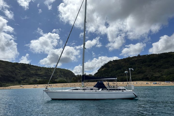 a small boat in a large body of water